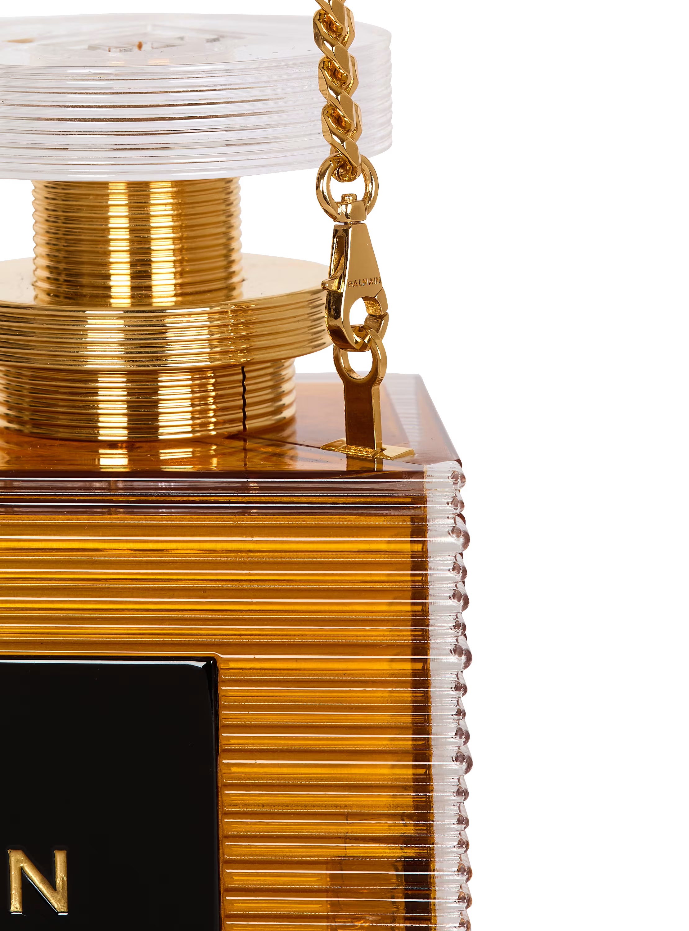 Perfume minaudière in resin and brass